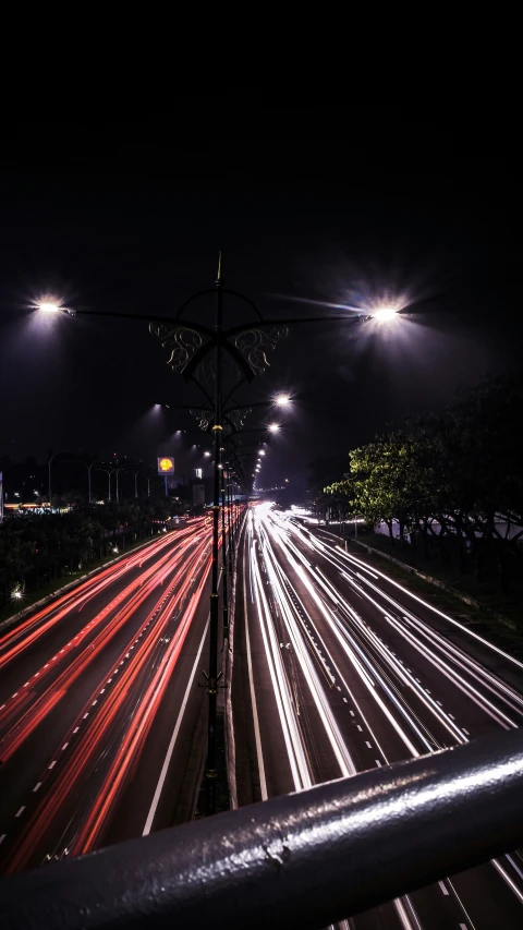 motion blur of car lights on highway at night