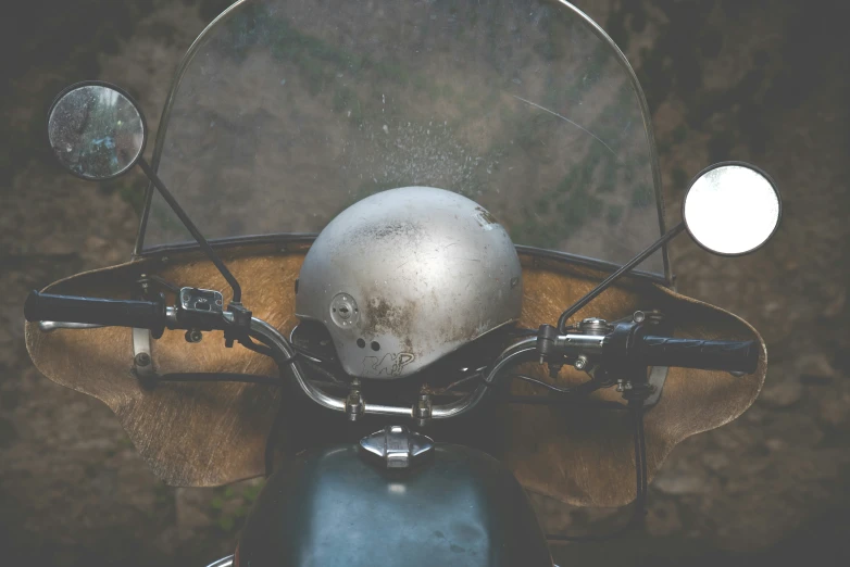 a closeup s of the headlight on a motorcycle