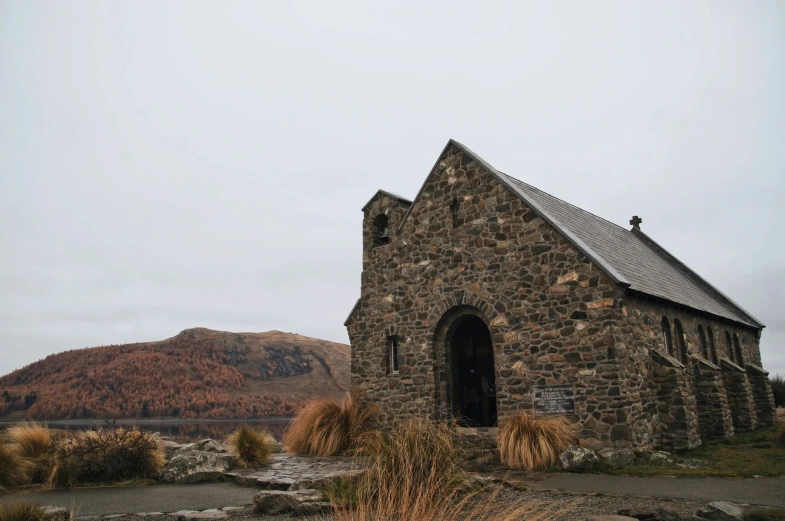 the church on the edge of a body of water