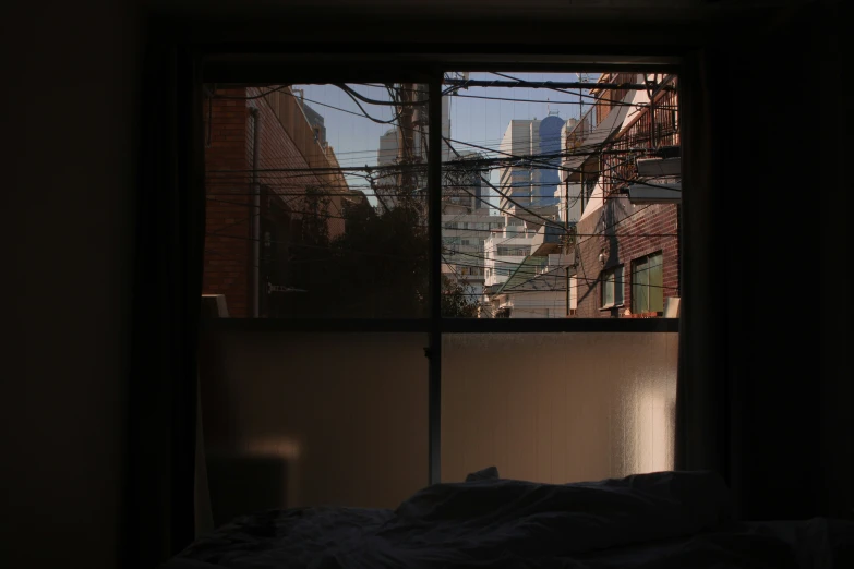 the view from a window into a bedroom