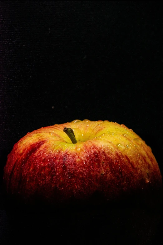 a painting of an apple with water droplets
