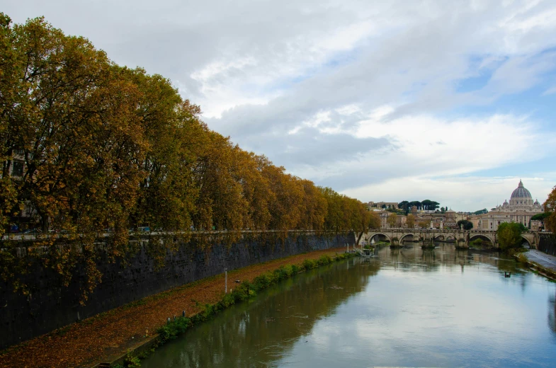 a river in a city is shown from the other side