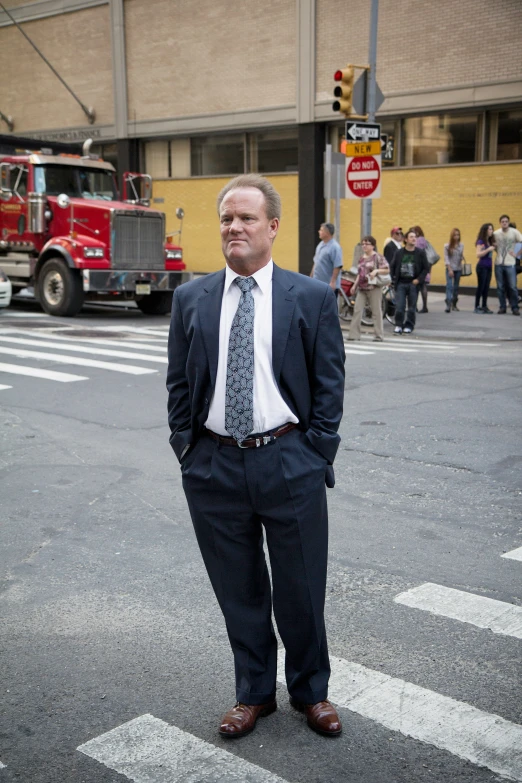 a man standing in the middle of a street