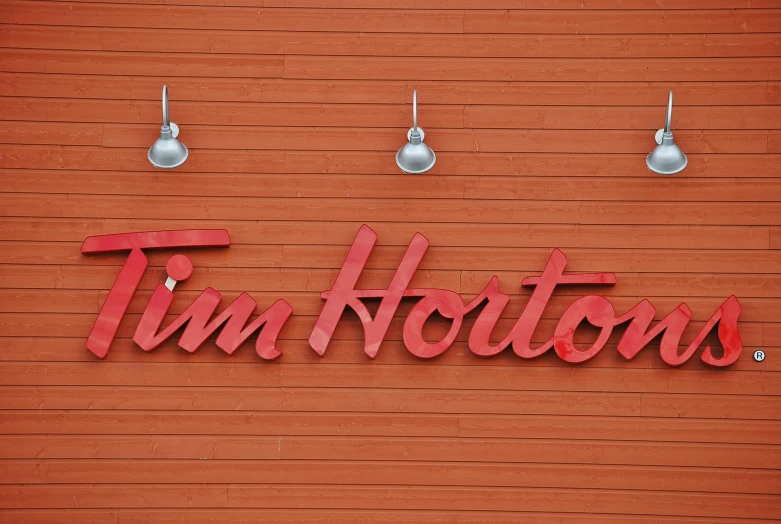 a wall with the word tim horton written in it