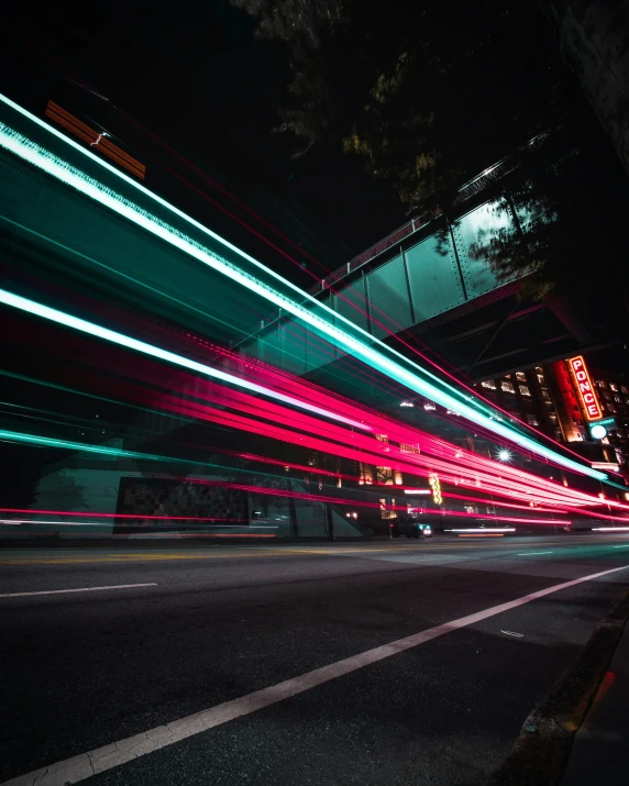 a blurry pograph of the lights of car on a road