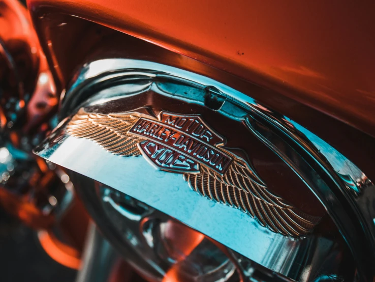 chrome emblems and wheels on a harley davidson motorcycle