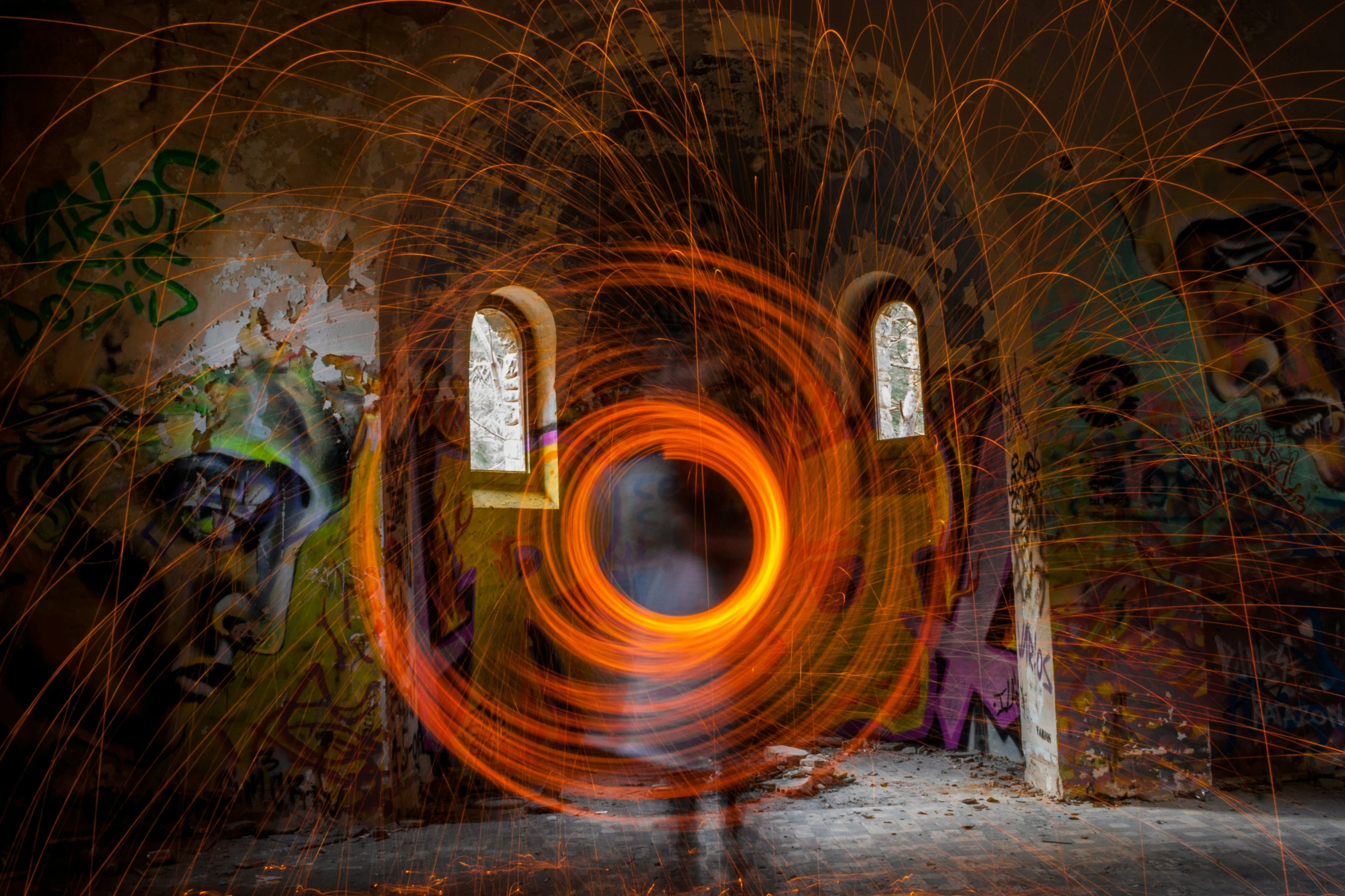 abstract pograph of a person standing in a room with graffiti