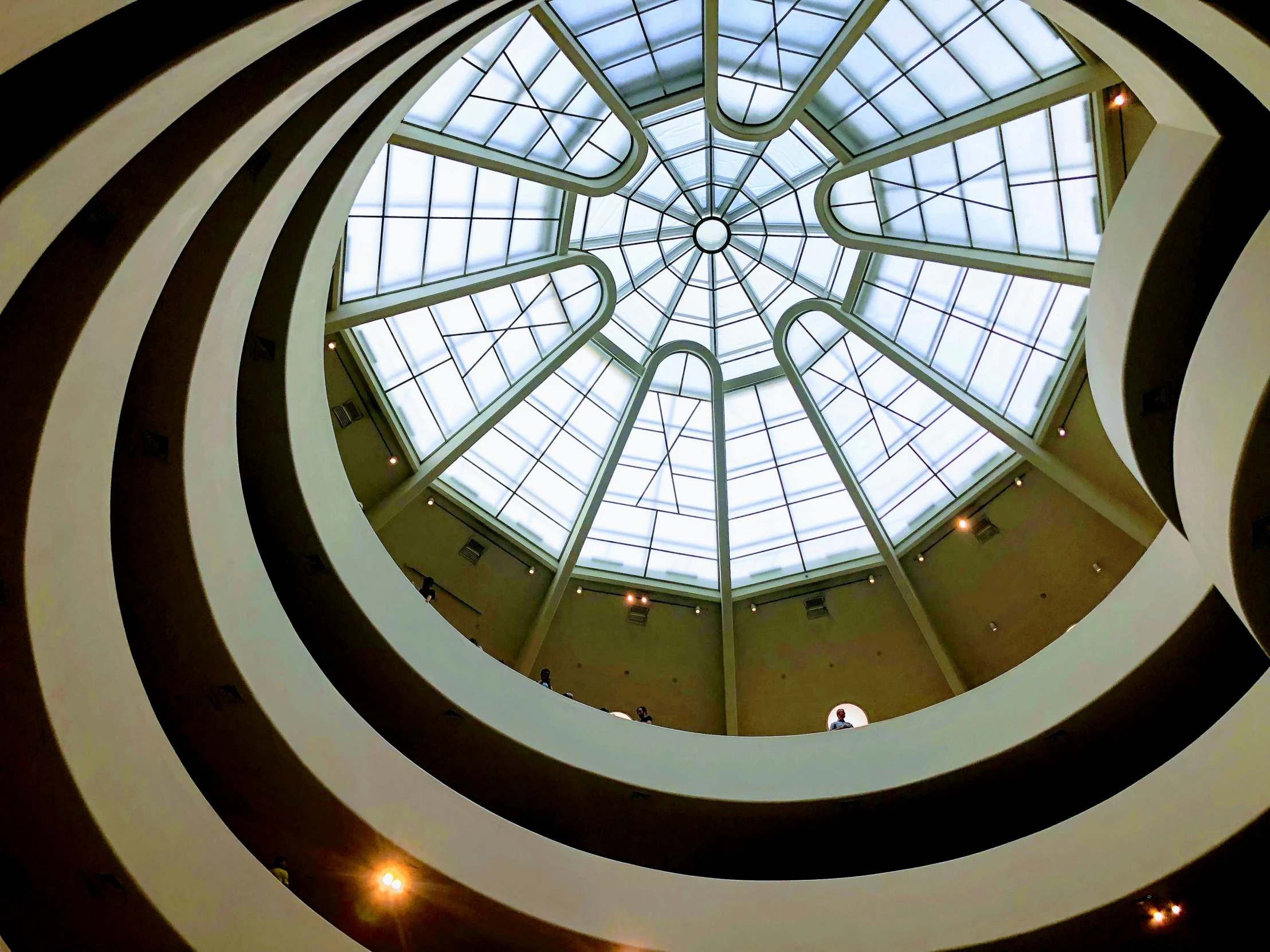 a view up into the ceiling of a round building