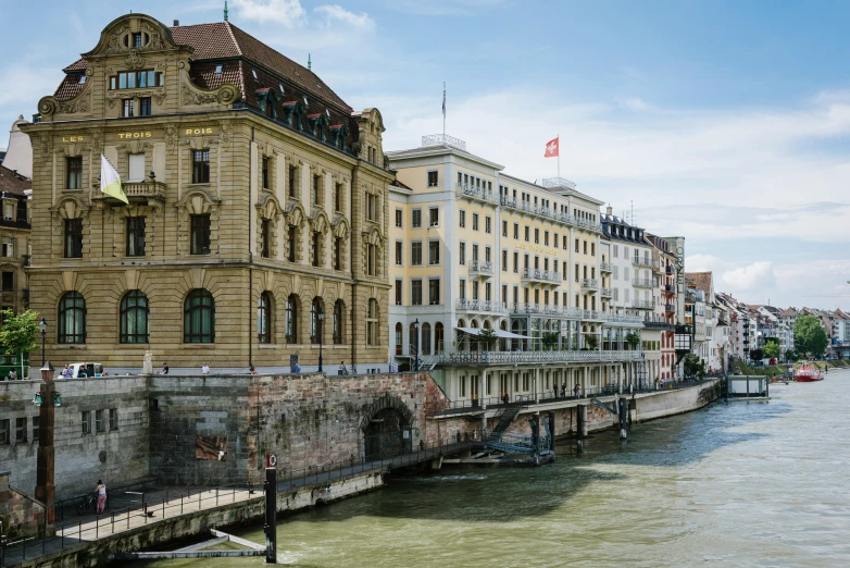 a view of some buildings on the edge of a canal