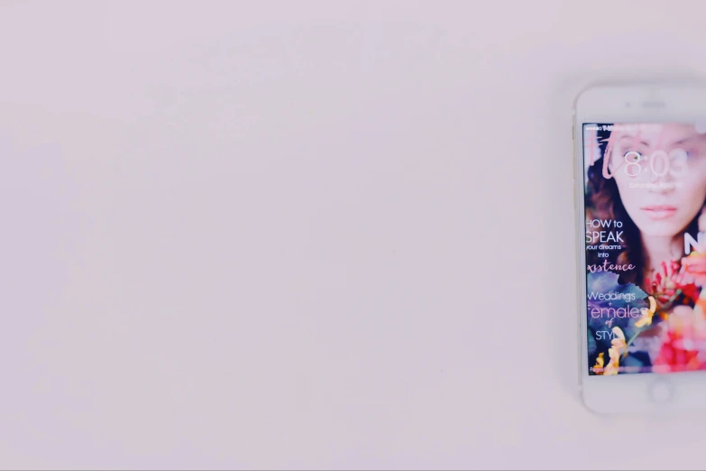 a close up of a cell phone on a table