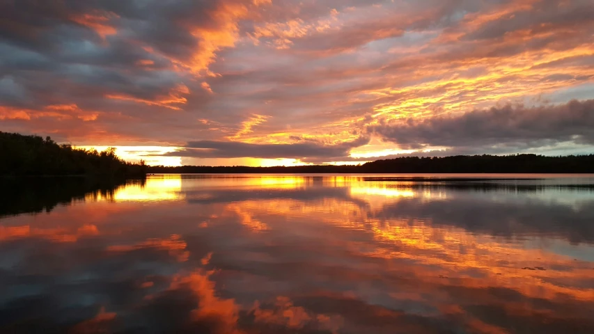 this is a beautiful sunset on the river