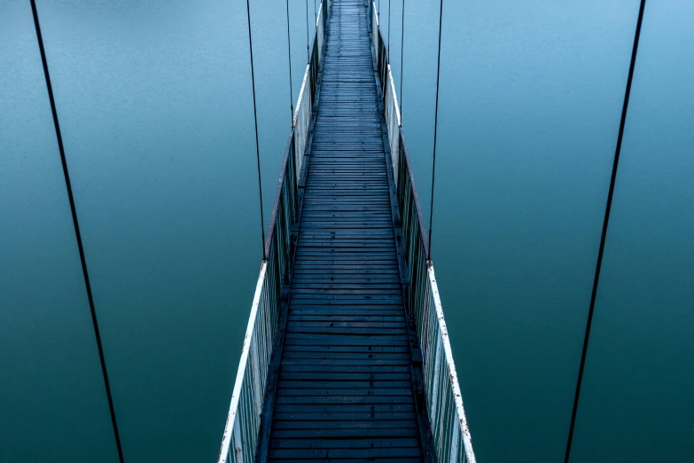 a large structure made out of wood in the middle of water