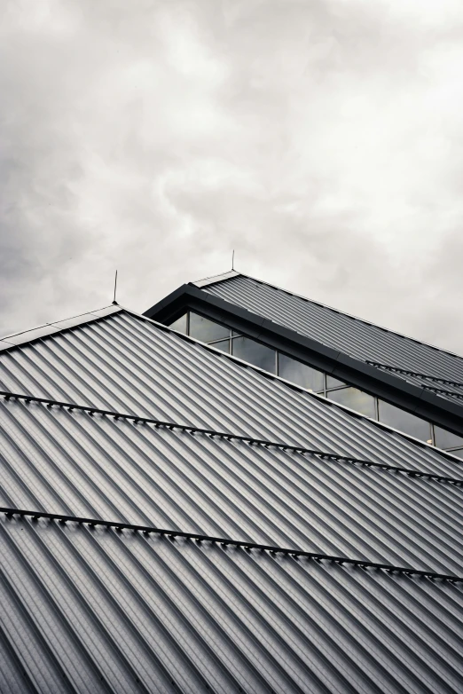 a roof with a bird sitting on top of it