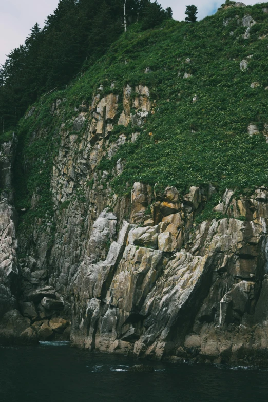 some people in the water and some rocks