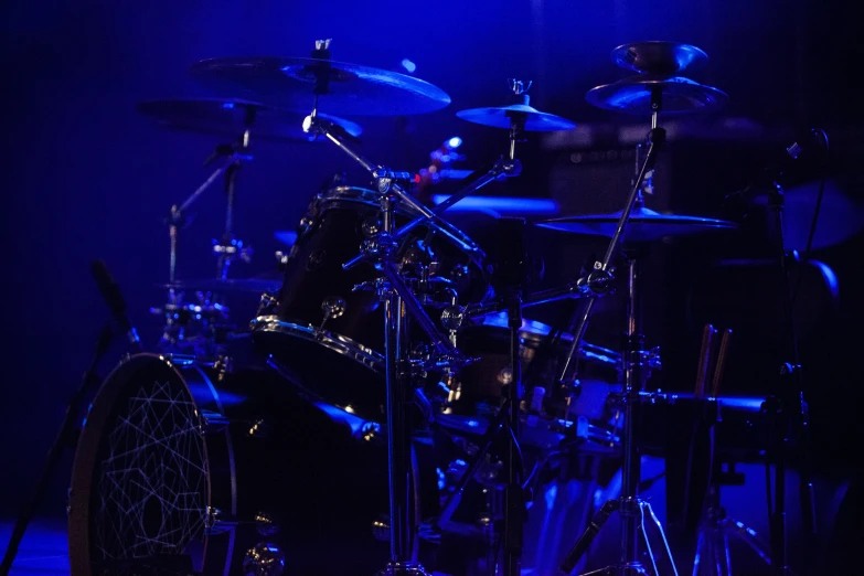 a drum set sitting on top of a stage