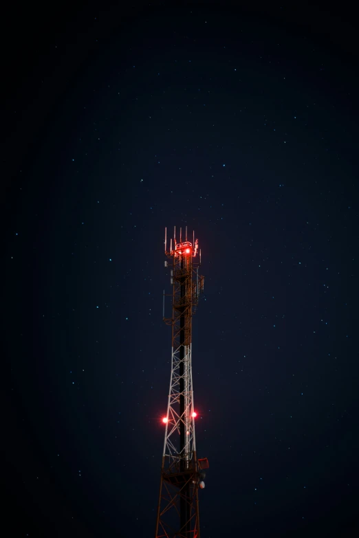 a tall tower with a light on top of it