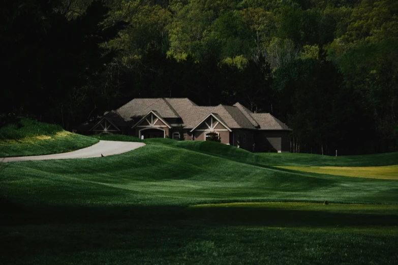 the house is next to a golf green