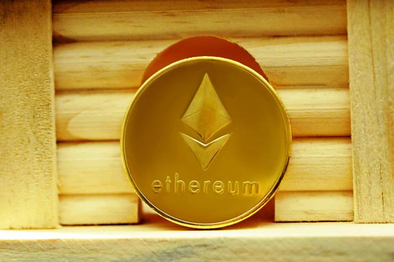 an ethercoin coin sits on a shelf