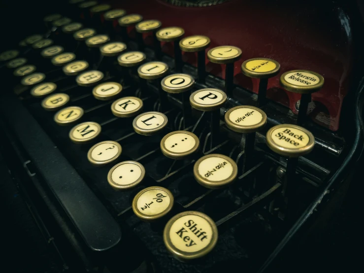 a close up of an old fashioned typewriter