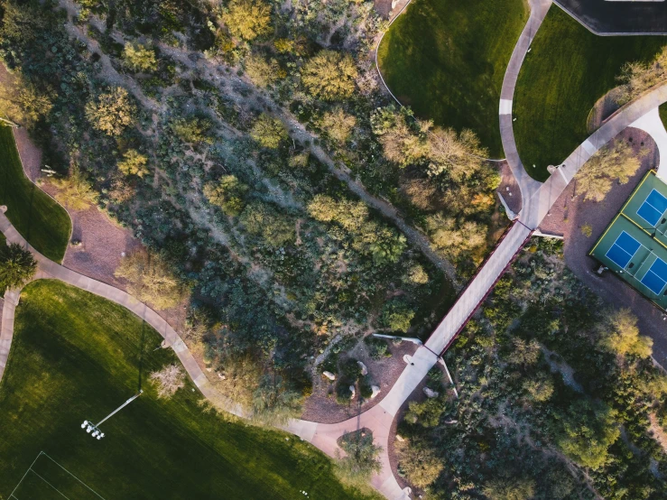 a tennis court and the ground from above