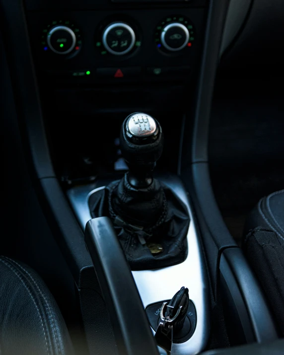 a view into the dash of an automobile with the gear  showing