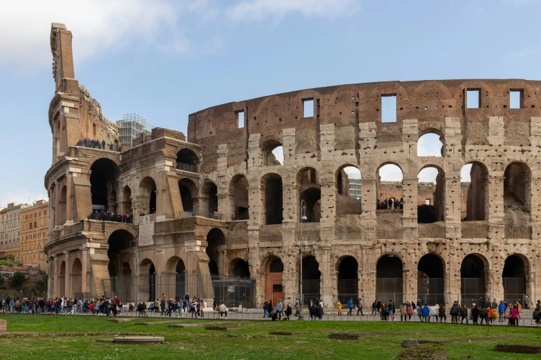 people are in an old building on a sunny day