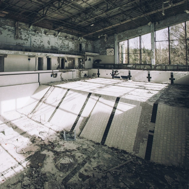 a empty gym filled with a number of stalls