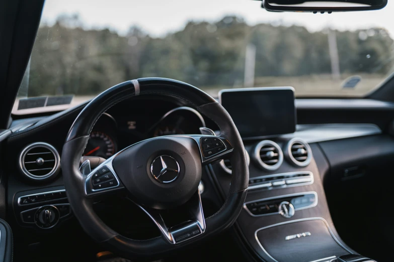 a car steering wheel and dashboard and dashboard ons