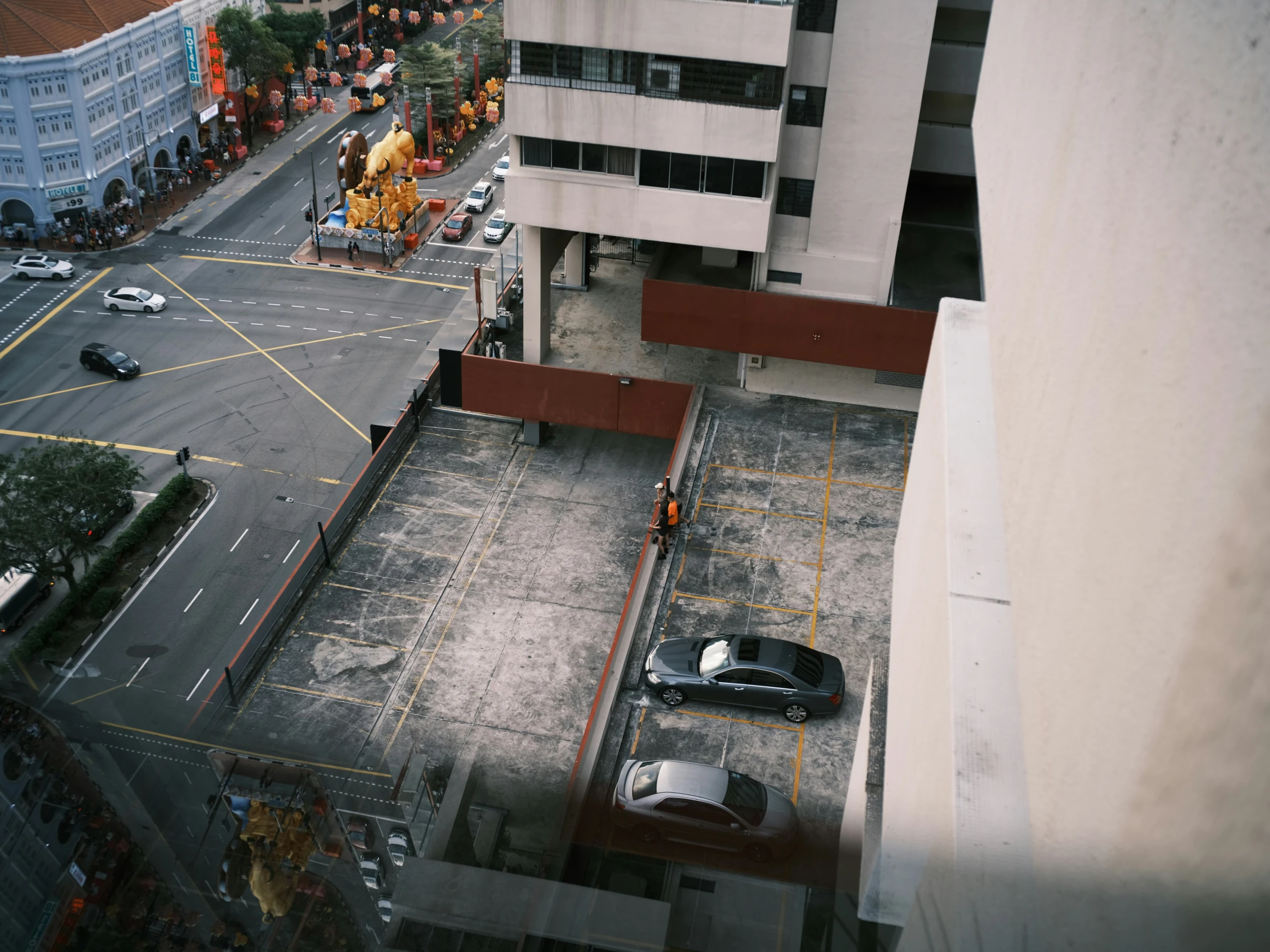 an overhead view of a city street in the rain