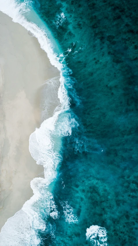 the sand and water in this view is gorgeous