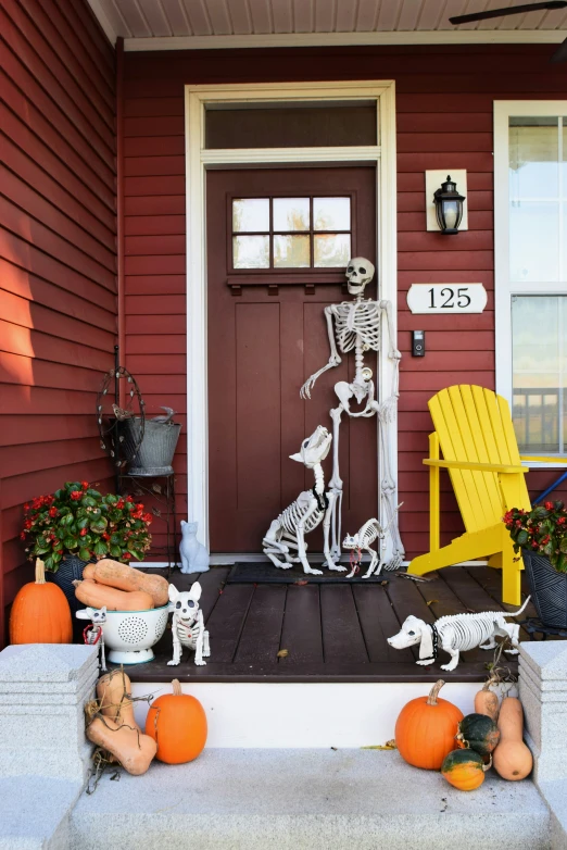 skeleton decorations are on the front porch