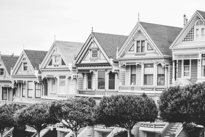 some beautiful victorian style houses in black and white