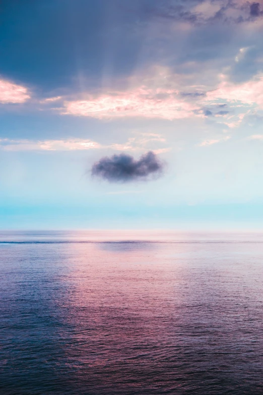 blue sky with clouds and a small boat in the water