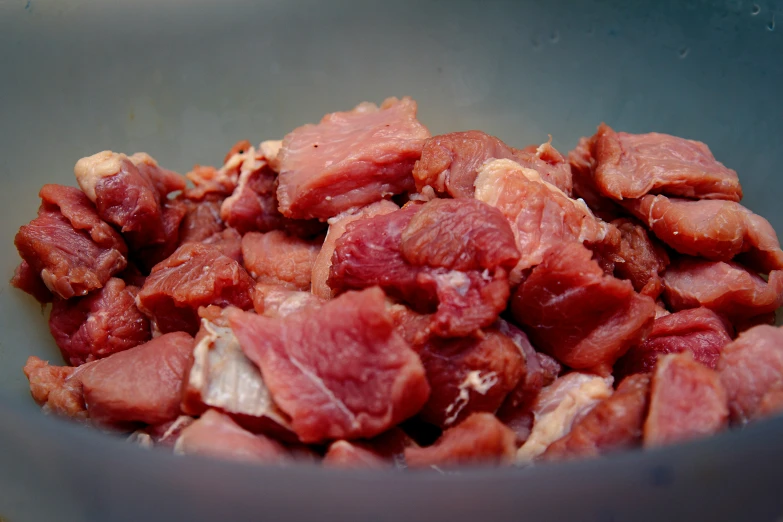 the chopped meat is in the bowl ready to eat