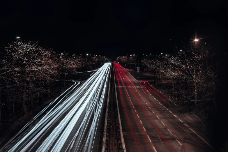 light streaks on the road from car lights at night