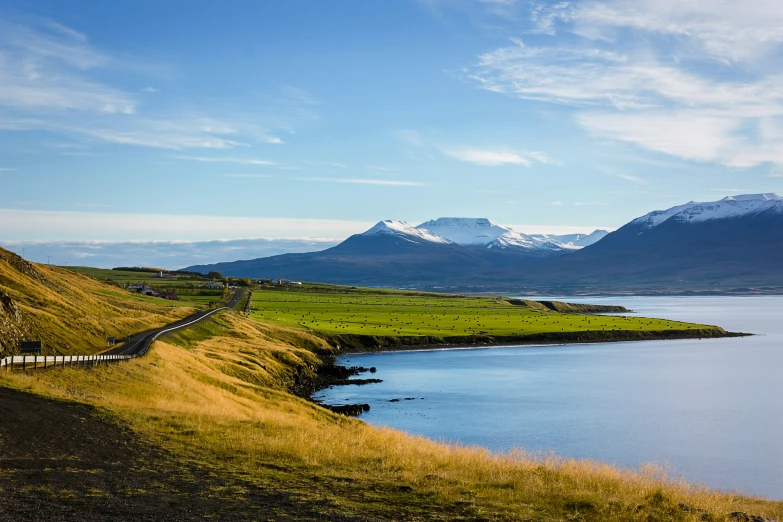 a scenic lake with mountains surrounding it