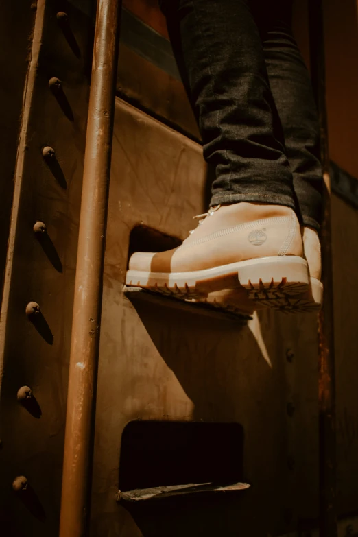 the foot on a stair lift has a large heel with white accents