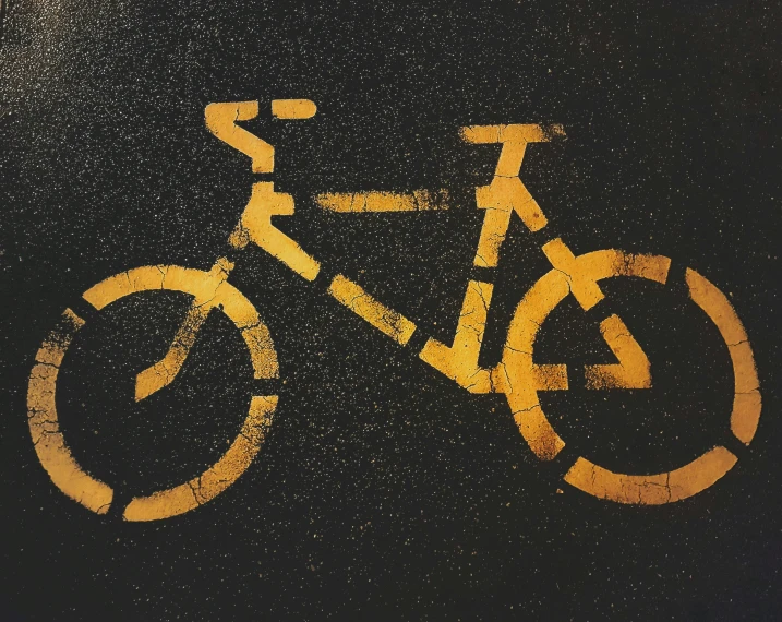 a sign with a bike painted on it