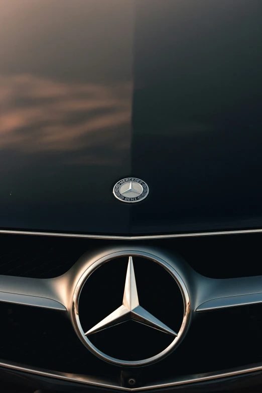 front grille emblem of a car with a mercedes logo