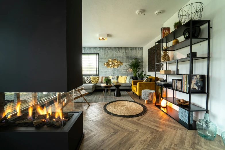 a living room with a fire place, yellow furniture and many accessories