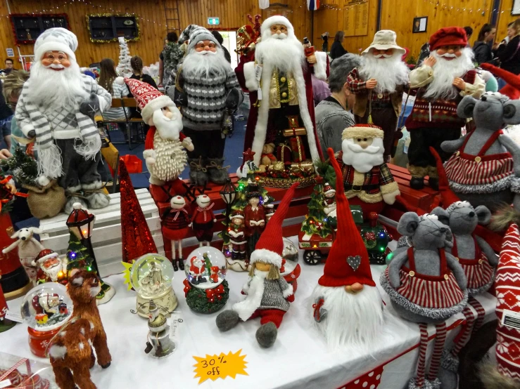 a table topped with lots of different figurines