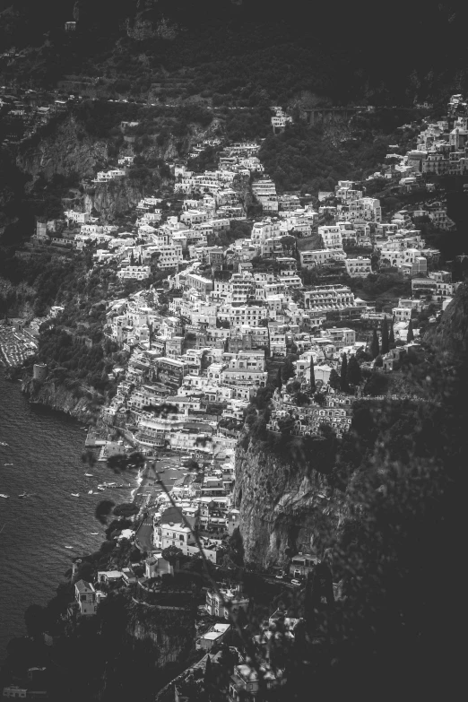 an aerial view of an island with several buildings