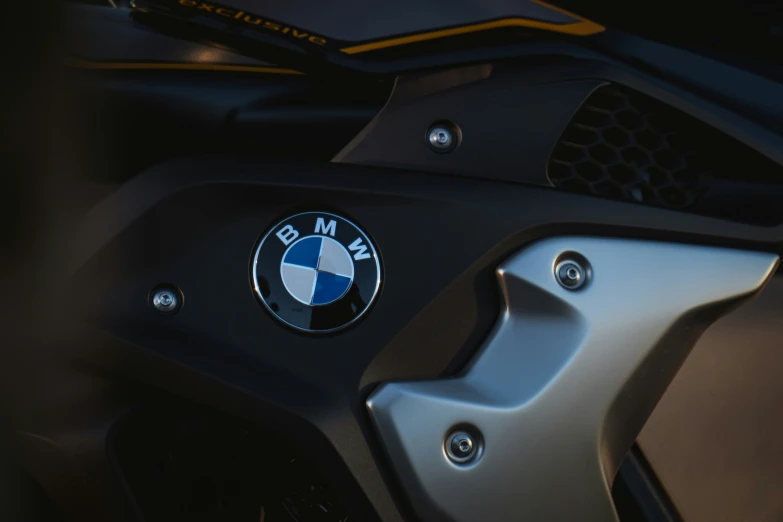 the bmw badge is shiny, chrome and black