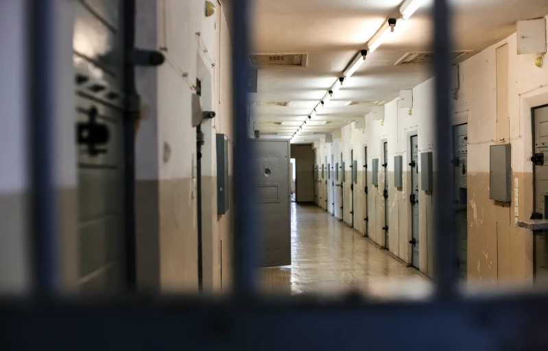 a hallway that has rows of lockers in it