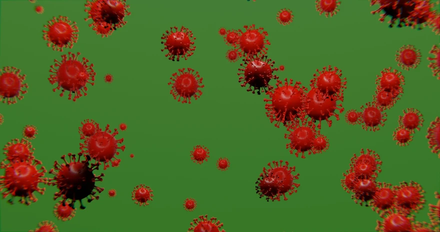 red  cells floating in the air on a green screen