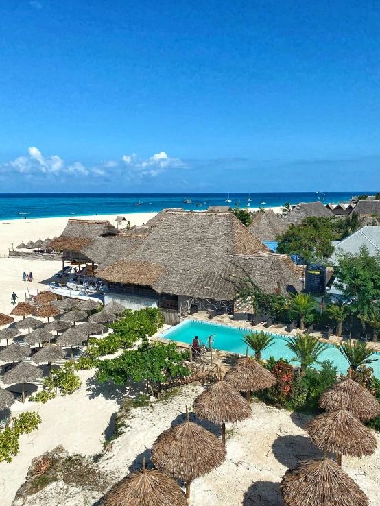 an ocean resort is seen from above on a clear day