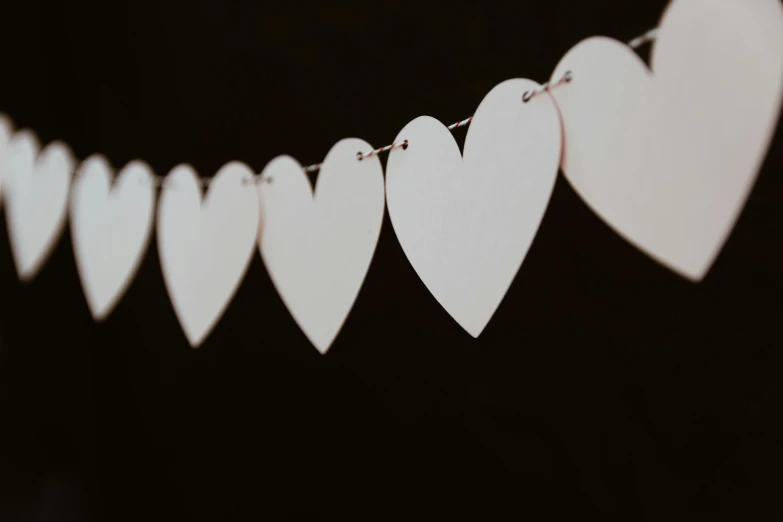 a string of hearts that have been cut into the shape of hearts