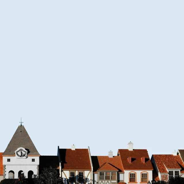 an airplane flies low in front of some buildings