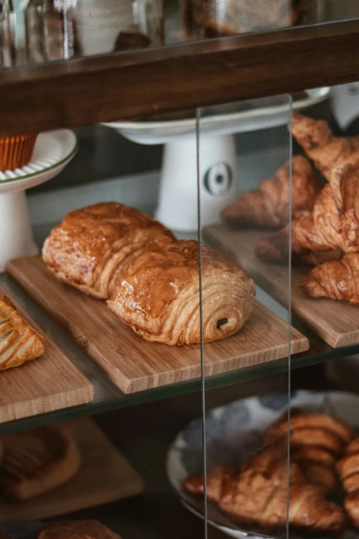 trays of baked goods sit behind glass