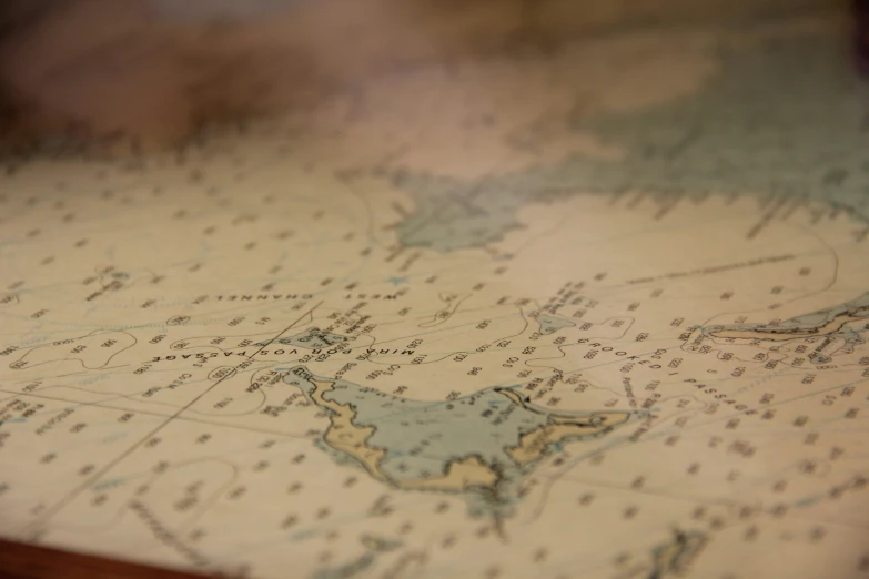 a close up image of a maps on the table